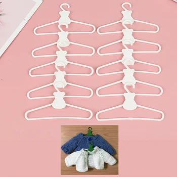 10 mini Pakabos baltas kailis Suknelė lėlės Plastiko Įrašą pakabos Dėl Lėlės drabužių Spinta Nuotrauka 0